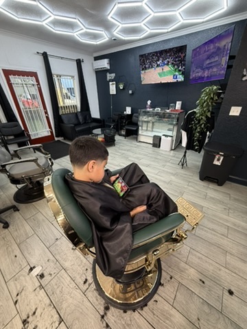 Young client relaxing in the gold chair